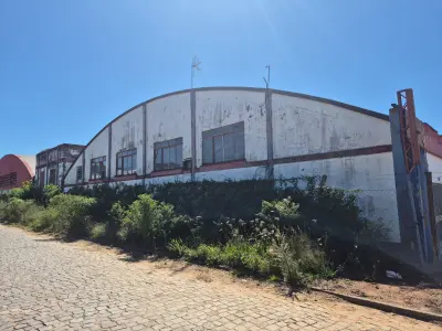 LOTE 001 - 40% de um terreno e suas edificações do imóvel de matrícula nº 129 do CRI de Restinga Seca