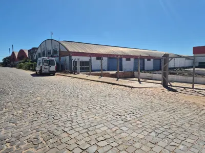 LOTE 001 - 40% de um terreno e suas edificações do imóvel de matrícula nº 129 do CRI de Restinga Seca